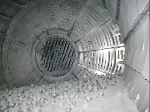 Grinding media for ball mills